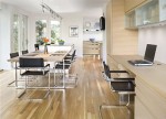 Big Kitchens in for suburban home with open bar and dining areas
