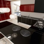 Contrasting red and black color Ultra modern kitchen design by Futura Cucine