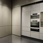 Giorgio Armani Calyx kitchens with long modern lines and bold flat accent