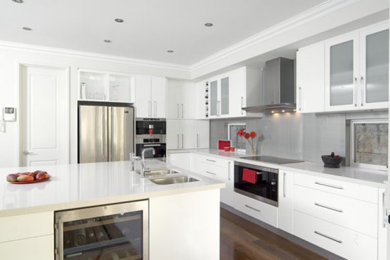 Glossy White Kitchen Designs cabinets and furniture by Australian kitchen designers