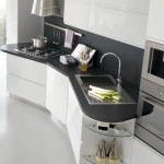Italian kitchens manufacturer play of contrasts and asymmetric shapes Italian kitchens manufacturer play of contrasts and asymmetric shapes