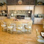 The rounded design on the dining side kitchen island
