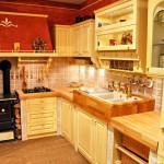 The striking red used as a major accent color of style French country kitchen The striking red used as a major accent color of style French country kitchen