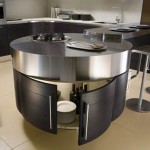 Ultra modernpurple kitchen with cylindrical fanabove stovetop Ultra modernpurple kitchen with cylindrical fanabove stovetop