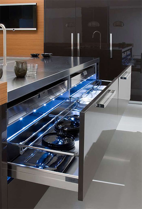 Urban Kitchens Design stainless steel double sink connected to the worktop from Copat
