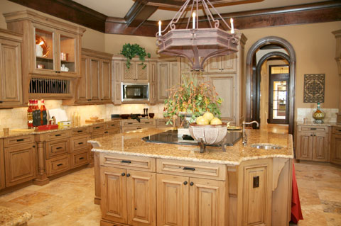 Wood cabinetry is center stage of kitchen