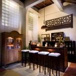 balinese kitchen pantry with antique style lamps hang and wood furniture ethnic