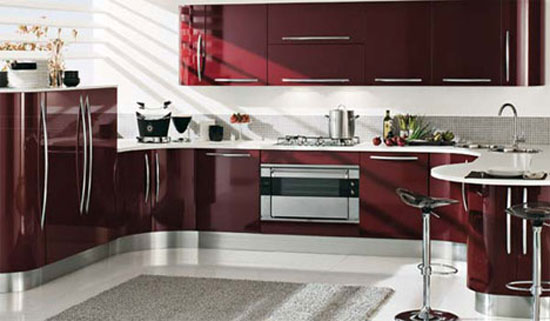 curved kitchens island with custom cabinetry gives ergonomic kitchens design