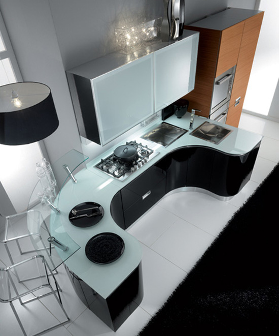 gleaming and glamorous kitchen with fluid sweeping workspaces by Fiamberti