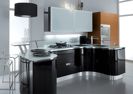 gleaming and glamorous kitchens with fluid sweeping workspaces by Fiamberti