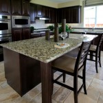 gorgeous slab of granite counter top extends well beyond the island cabinets gorgeous slab of granite counter top extends well beyond the island cabinets