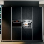 kitchendesign with thick worktop top cupboard and natural panels in light or dark finishes