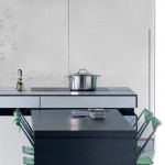 massive paneled wall units Urban Kitchens from Bazzeo New Gaia covered with lights organic pattern