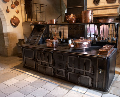 medieval styling of kitchen island for cooking with a little storage