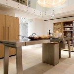 minimal kitchen island design simple and sleek look with art-inspired faucets