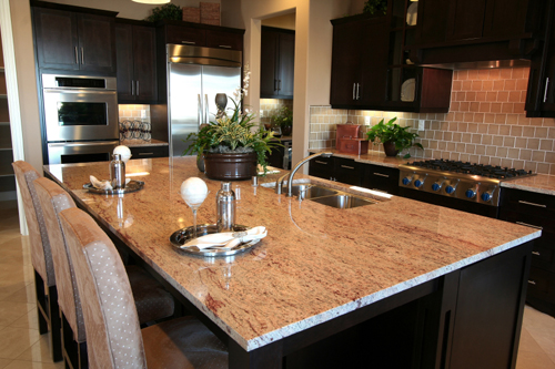 the functional sleek granite on kitchen island