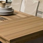 Unusual dining table with wood and stainless steel material