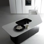 white countertops contrast to the dark wood cabinetry is quite refreshing design