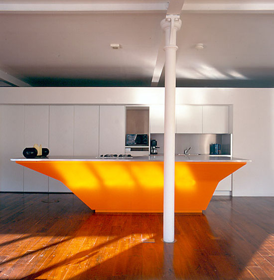 Unusual bright orange Kitchen Island combination of old and new traditions by A-EM Architects