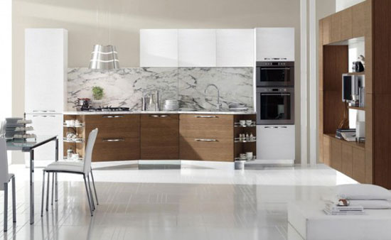 This kitchen is a model of Porter collection. The main idea of this kitchen design is a game of contrasts and asymmetrical forms. More information about this new site design STOSA modern kitchen. The kitchens in this collection are also available in other colors and natural wood finish. that is White Cabinets in Modern Italian Kitchen Design from Stosa from hote-ls.com