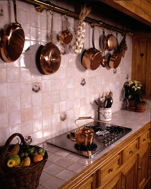 the technique of hanging cookware is a signature French kitchen attribute